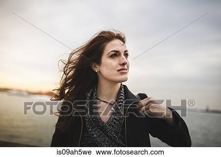 Young woman next to Hudson river, New York, USA View Large Photo Image Stock Image - Young woman next to Hudson river, New York, USA. Fotosearch