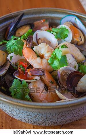 Aruban food, bowl of prawns and shellfish with garnish View Large Photo Image Stock Image - Aruban food, bowl of prawns and shellfish with garnish. Fotosearch