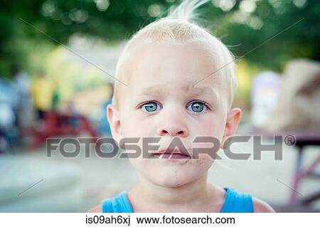 Close up portrait of blue eyed male toddler View Large Photo Image Stock Image - Close up portrait of blue eyed male toddler. Fotosearch