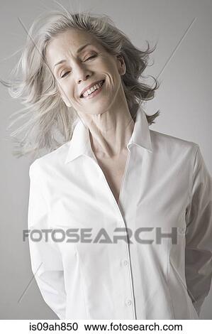 Mature woman smiling View Large Photo Image Stock Image - Mature woman smiling. Fotosearch