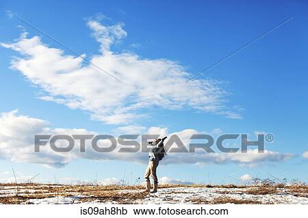 Mature woman with arms outstretched in landscape View Large Photo Image Stock Image - Mature woman with arms outstretched in landscape. Fotosearch