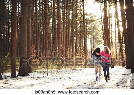 Mature women walking in forest View Large Photo Image Stock Photography - Mature women walking in forest. Fotosearch