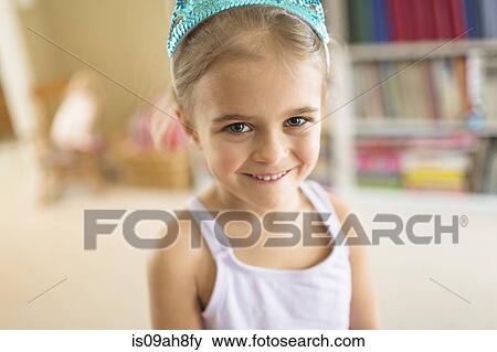 Stock Photo - Portrait of cute young girl in princess crown. Fotosearch