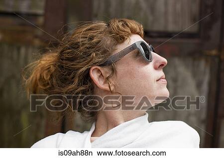 Portrait of woman in sunglasses View Large Photo Image Picture - Portrait of woman in sunglasses. Fotosearch