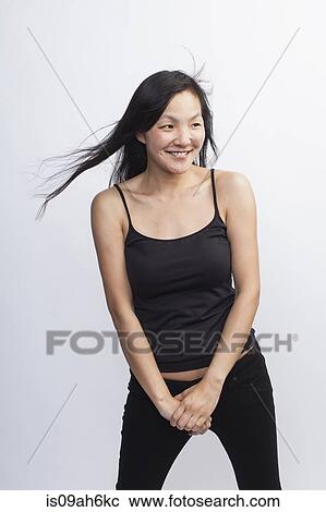 Studio portrait of mid adult woman View Large Photo Image Stock Image - Studio portrait of mid adult woman. Fotosearch