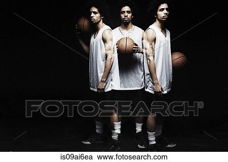 Basketball player holding basketball View Large Photo Image Stock Image - Basketball player holding basketball. Fotosearch