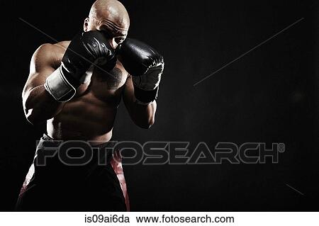 Boxer punching View Large Photo Image Stock Image - Boxer punching. Fotosearch