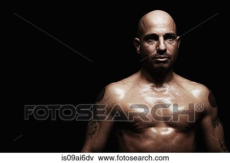 Stock Photo - Boxer with shaved head. Fotosearch
