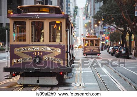 Stock Photo - Cable cars on city street, San Francisco, California, USA. Fotosearch