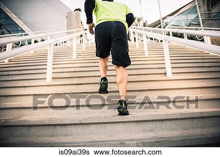 Cropped shot of mature male runner training on steps View Large Photo Image Stock Photograph - Cropped shot of mature male runner training on steps. Fotosearch