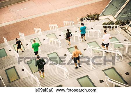 Group of runners training on convention center steps View Large Photo Image Stock Image - Group of runners training on convention center steps. Fotosearch