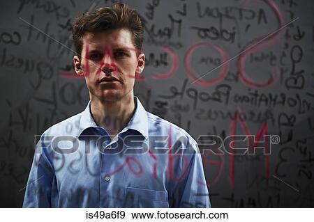 Portrait of businessman behind writing on glass View Large Photo Image Stock Photo - Portrait of businessman behind writing on glass. Fotosearch