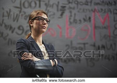 Portrait of businesswoman wearing jacket with writing View Large Photo Image Stock Image - Portrait of businesswoman wearing jacket with writing. Fotosearch