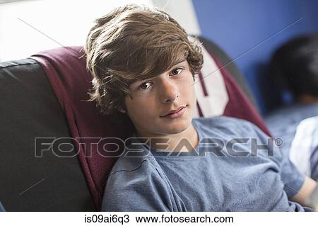 Stock Image - Portrait of teenage boy. Fotosearch
