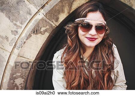 Portrait of young woman in arch doorway View Large Photo Image Stock Image - Portrait of young woman in arch doorway. Fotosearch