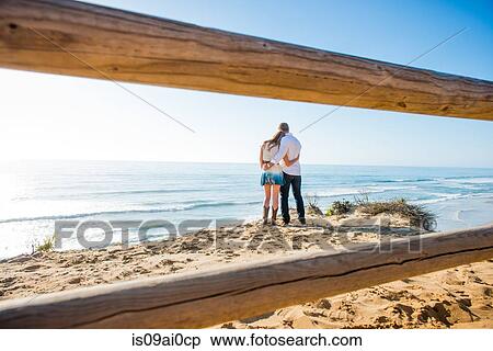 Romantic young couple on beach, Torrey Pines, San Diego, California, USA View Large Photo Image Stock Photography - Romantic young couple on beach, Torrey Pines, San Diego, California, USA. Fotosearch