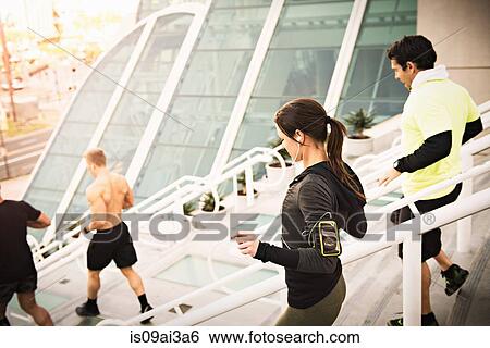 Small group of runners training on convention center steps View Large Photo Image Stock Photograph - Small group of runners training on convention center steps. Fotosearch