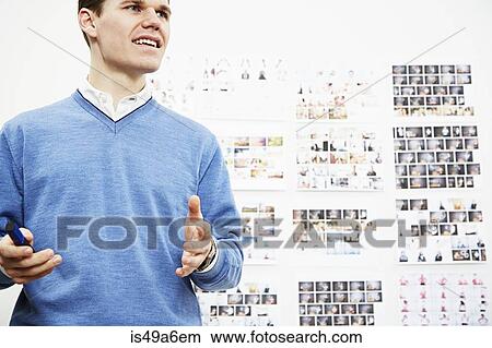 Young man in creative studio View Large Photo Image Picture - Young man in creative studio. Fotosearch