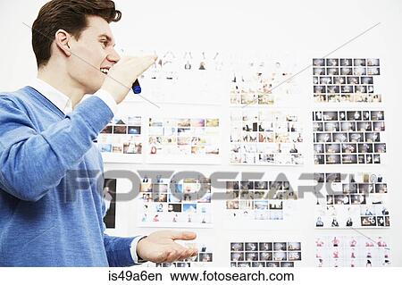 Young man in creative studio View Large Photo Image Picture - Young man in creative studio. Fotosearch