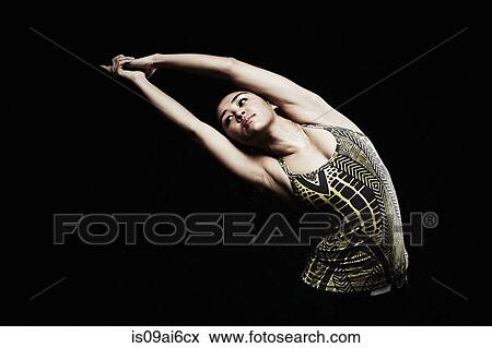 Young woman bending sideways View Large Photo Image Stock Photo - Young woman bending sideways. Fotosearch