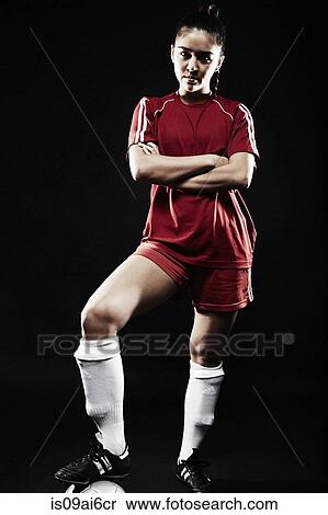 Young woman wearing football uniform View Large Photo Image Stock Photography - Young woman wearing football uniform. Fotosearch