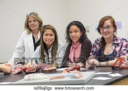 Biology students in classroom with teacher View Large Photo Image Picture - Biology students in classroom with teacher. Fotosearch