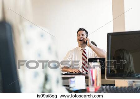 Business lawyer chatting on smartphone in office View Large Photo Image Stock Image - Business lawyer chatting on smartphone in office. Fotosearch