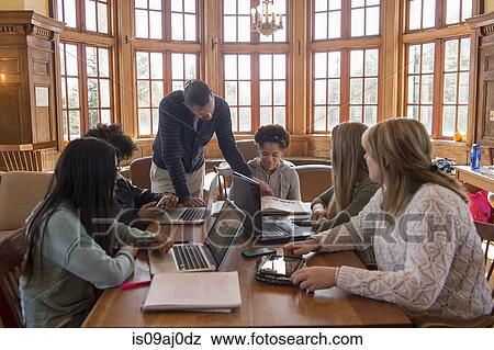 College students using laptops View Large Photo Image Stock Photo - College students using laptops. Fotosearch