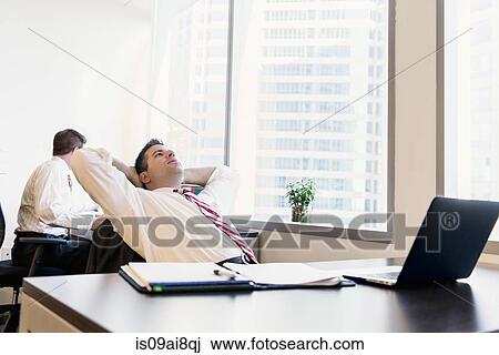Stock Image - Male business lawyers working in office. Fotosearch