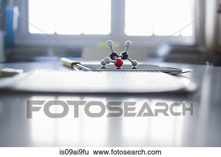 Molecular model of Ethanol molecule atop digital tablet View Large Photo Image Stock Photograph - Molecular model of Ethanol molecule atop digital tablet. Fotosearch