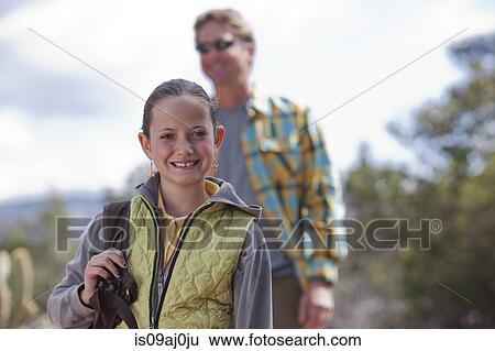Portrait of father and daughter out hiking, Sedona, Arizona, USA View Large Photo Image Stock Photograph - Portrait of father and daughter out hiking, Sedona, Arizona, USA. Fotosearch