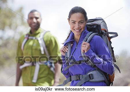Stock Photography - Portrait of mature female and her boyfriend hiking, Sedona, Arizona, USA. Fotosearch