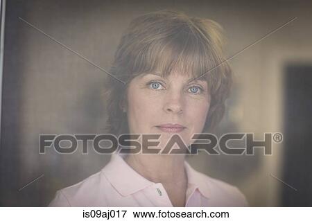 Portrait of mid adult woman, pensive expression View Large Photo Image Stock Photo - Portrait of mid adult woman, pensive expression. Fotosearch