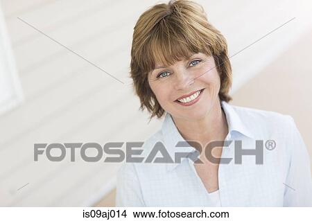 Portrait of mid adult woman View Large Photo Image Picture - Portrait of mid adult woman. Fotosearch