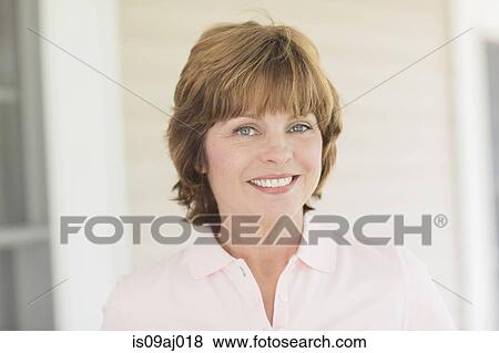 Portrait of mid adult woman View Large Photo Image Stock Photo - Portrait of mid adult woman. Fotosearch