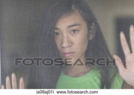 Portrait of teenage girl, pensive expression View Large Photo Image Stock Image - Portrait of teenage girl, pensive expression. Fotosearch