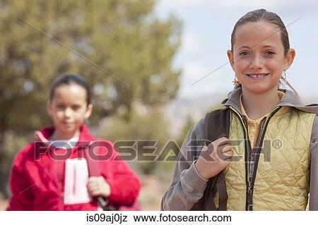 Portrait of two girls out hiking, Sedona, Arizona, USA View Large Photo Image Stock Photo - Portrait of two girls out hiking, Sedona, Arizona, USA. Fotosearch