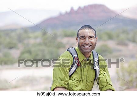 Portrait of young male hiker, Sedona, Arizona, USA View Large Photo Image Stock Photograph - Portrait of young male hiker, Sedona, Arizona, USA. Fotosearch