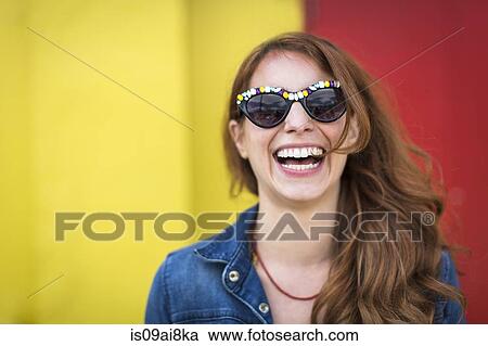 Portrait of young woman laughing View Large Photo Image Stock Image - Portrait of young woman laughing. Fotosearch