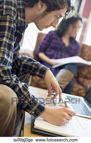 Student making notes View Large Photo Image Stock Image - Student making notes. Fotosearch