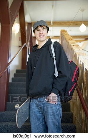 Student on staircase with skateboard View Large Photo Image Stock Image - Student on staircase with skateboard. Fotosearch