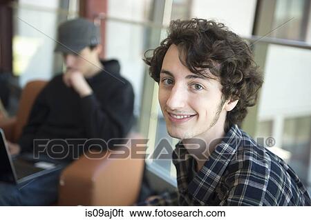 Student with brown curly hair, portrait View Large Photo Image Stock Photograph - Student with brown curly hair, portrait. Fotosearch