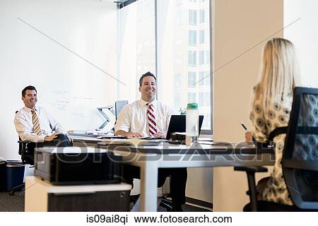 Three business lawyers meeting in office View Large Photo Image Stock Image - Three business lawyers meeting in office. Fotosearch