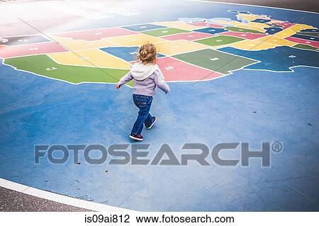 Toddler walking over map of USA in playground View Large Photo Image Stock Image - Toddler walking over map of USA in playground. Fotosearch