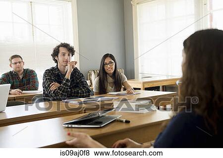 Stock Photo - University students in classrooom. Fotosearch