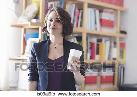 Young woman taking coffee break View Large Photo Image Picture - Young woman taking coffee break. Fotosearch