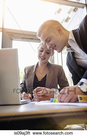 Businessman and businesswoman colleagues View Large Photo Image Stock Photograph - Businessman and businesswoman colleagues. Fotosearch