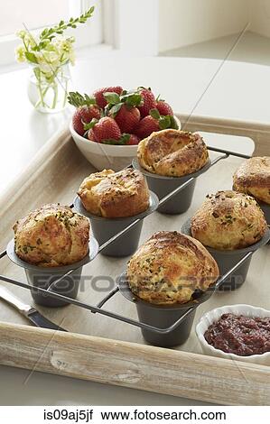 Cheddar chive popovers served with a fresh strawberry chutney View Large Photo Image Stock Image - Cheddar chive popovers served with a fresh strawberry chutney. Fotosearch