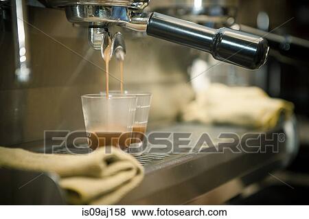 Close up of coffee machine pouring espresso in cafe View Large Photo Image Stock Photo - Close up of coffee machine pouring espresso in cafe. Fotosearch