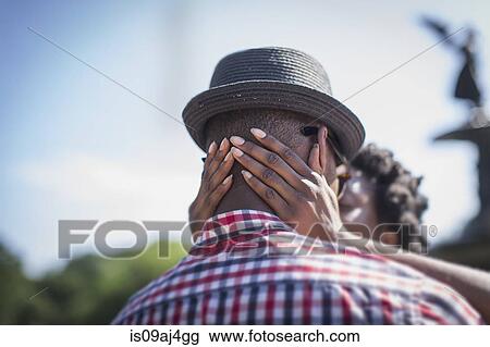 Close up of young couple kissing next to Bethesda fountain, Central Park, New York City, USA View Large Photo Image Stock Image - Close up of young couple kissing next to Bethesda fountain, Central Park, New York City, USA. Fotosearch